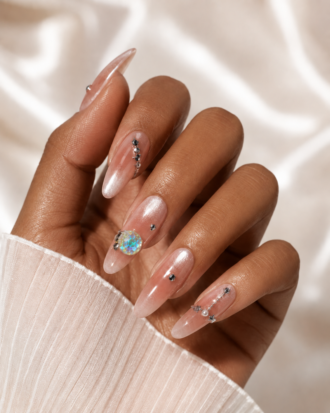 Opal Galaxy Press-On Nail Set worn on hand